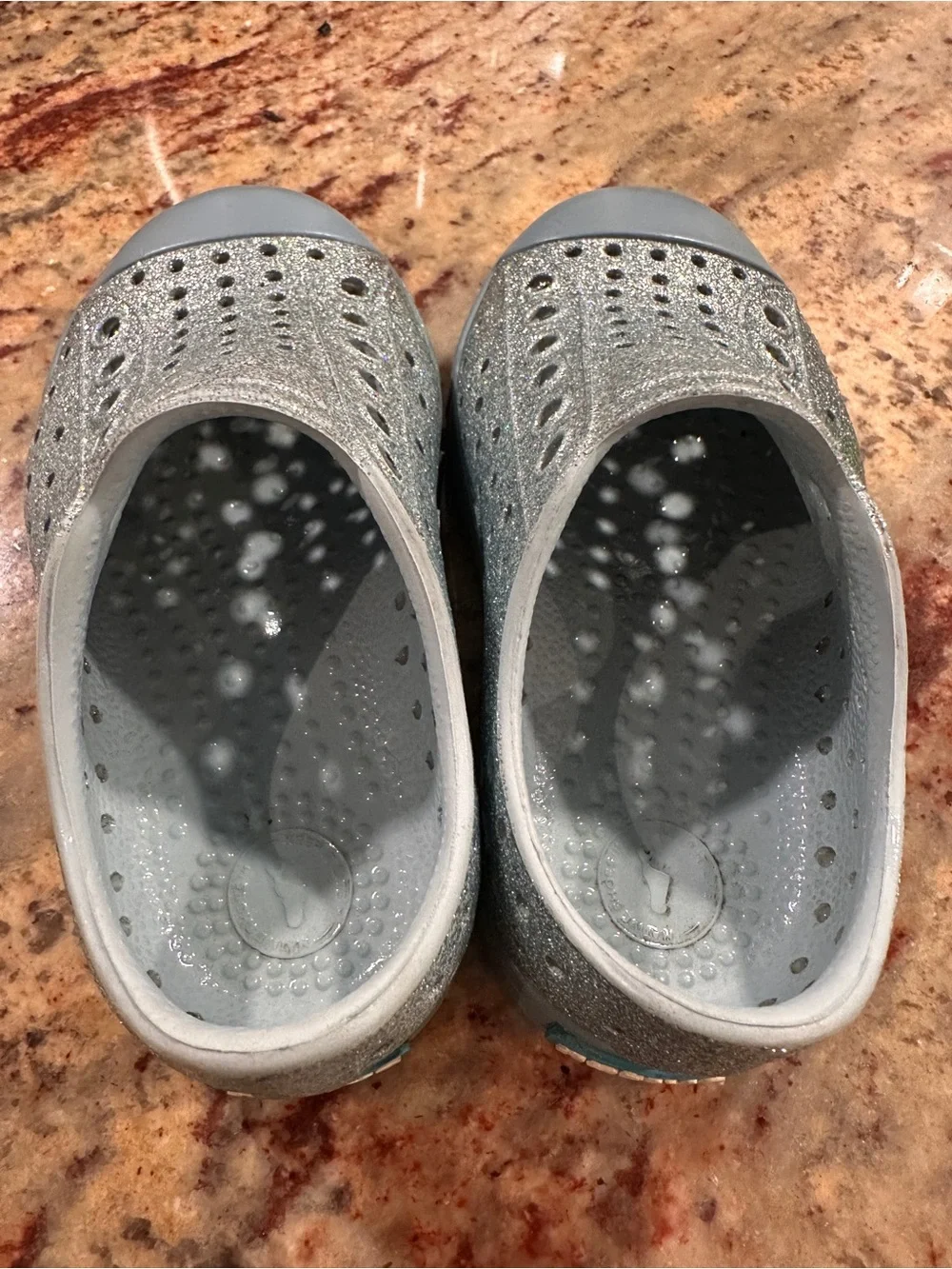 2 pairs of Native Toddler Silver Glitter Jefferson and white Slip-On Water Shoes